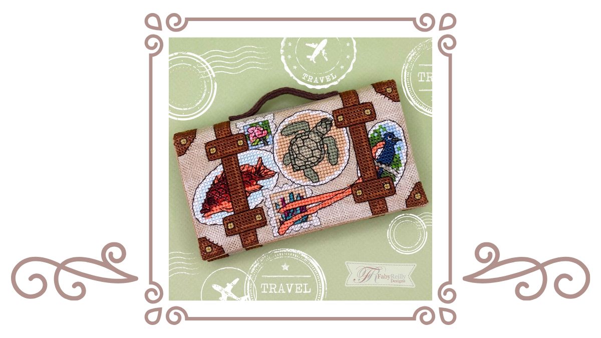 Picture of the stitched model for the Bon Voyage Mini Suitcase by Faby Reilly Designs